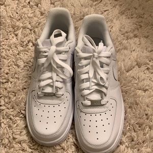 Never worn NIKE Air Force ones.